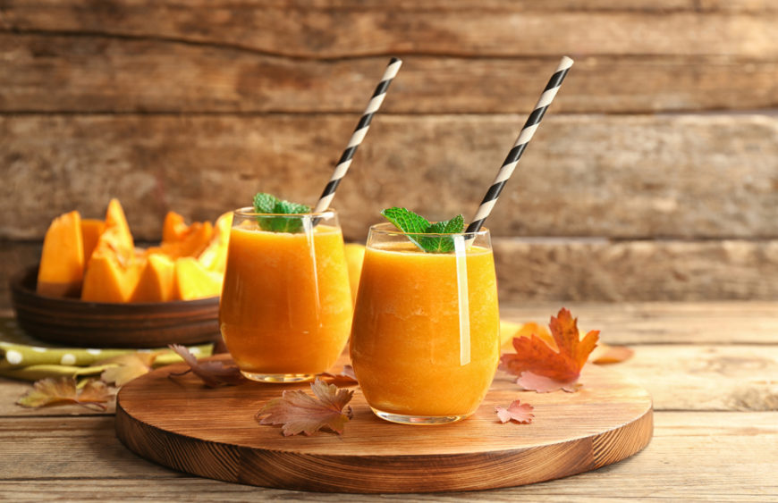 Two,Glasses,With,Pumpkin,Smoothie,On,Wooden,Board